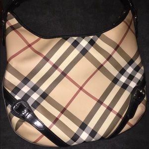 Burberry supernova check buckle hobo black. Condition is Pre-owned.